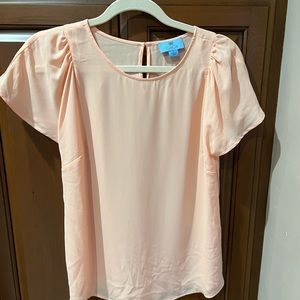 Peach top. Flutter sleeves. Size small.  Button neck closure.